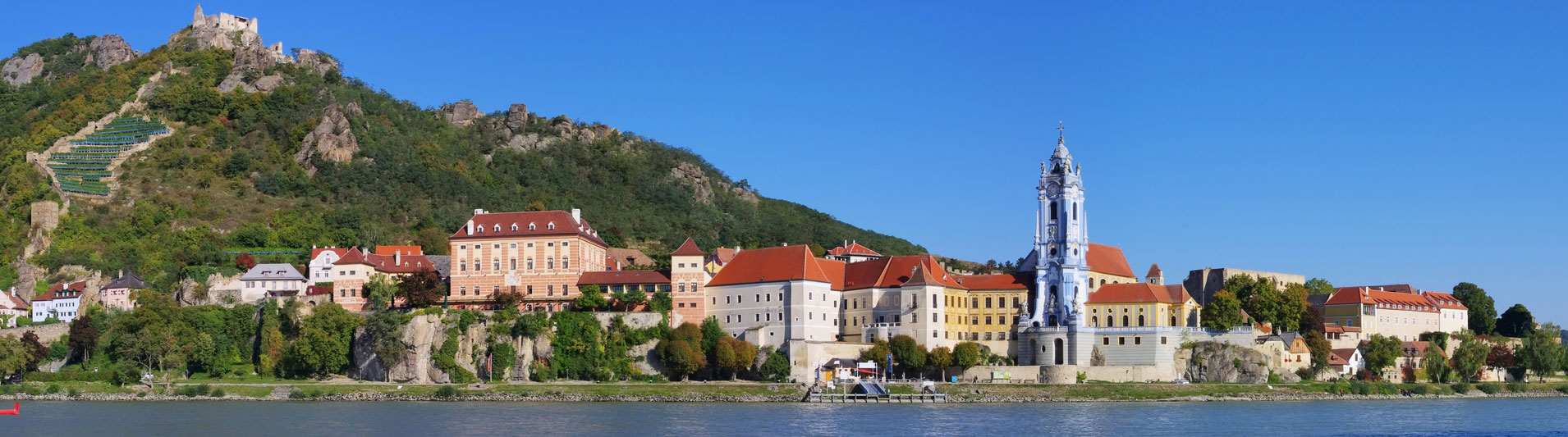 Dürnstein’s blue-and-white abbey tower and castle hill above the Danube